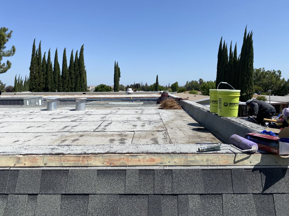 Slide of McGraw and Sons Roofing