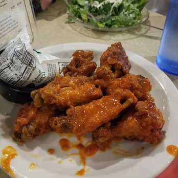 George's Vineyard - a plate of chicken wings and a bottle of beer - Pizza Near Me - Northfield, Minnesota