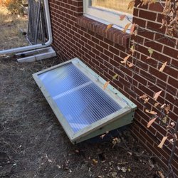 Hinged window well cover.