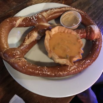 Max's Taphouse - Pretzel with cheese and mustard (spicy cheese) - American Near Me - Baltimore, Maryland