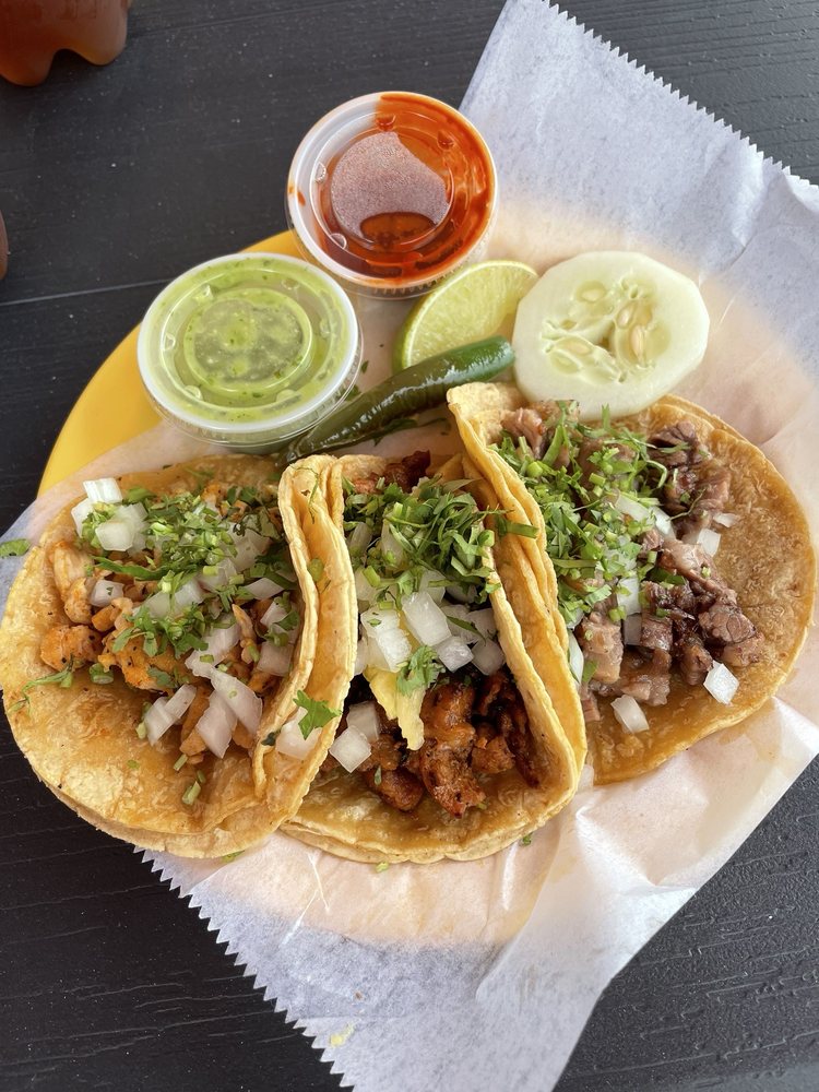Taqueria El Pastor Dorado Logo