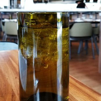 Café Mercato - Reclaimed/repurposed wine bottle water glasses. - Italian Near Me - Denver, Colorado