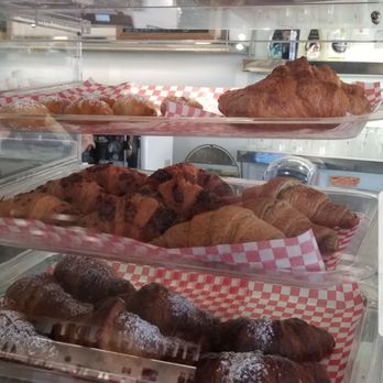 Faema Caffe - a variety of pastries in a display case - Appliances Near Me - Concord, Ontario