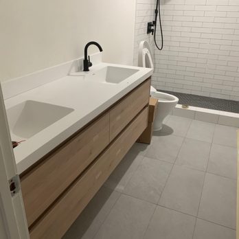 East Star Building Supply - Custom bathroom vanity, floor tiles, Toto toilet, Hansgrohe shower system from East Star. - Kitchen & Bath Near Me - Fremont, California