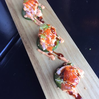 Tsui Sushi Bar - A special app not on the menu brought out by the manager! Seared salmon and cucumber bite - Sushi Bars Near Me - Seattle, Washington Tsui Sushi Bar - A special app not on the menu brought out by the manager! Seared salmon and cucumber bite - Sushi Bars Near Me - Seattle, Washington