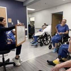 Encompass Health Rehabilitation Hospital of Plano - A fun game of Hangman combined with "churning butter" arm exercises. Very creative and fun!