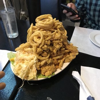 Captain John's - Fisherman's platter. Add onion rings for extra $1.75. Very fresh and good! - Seafood Near Me - Lowell, Massachusetts