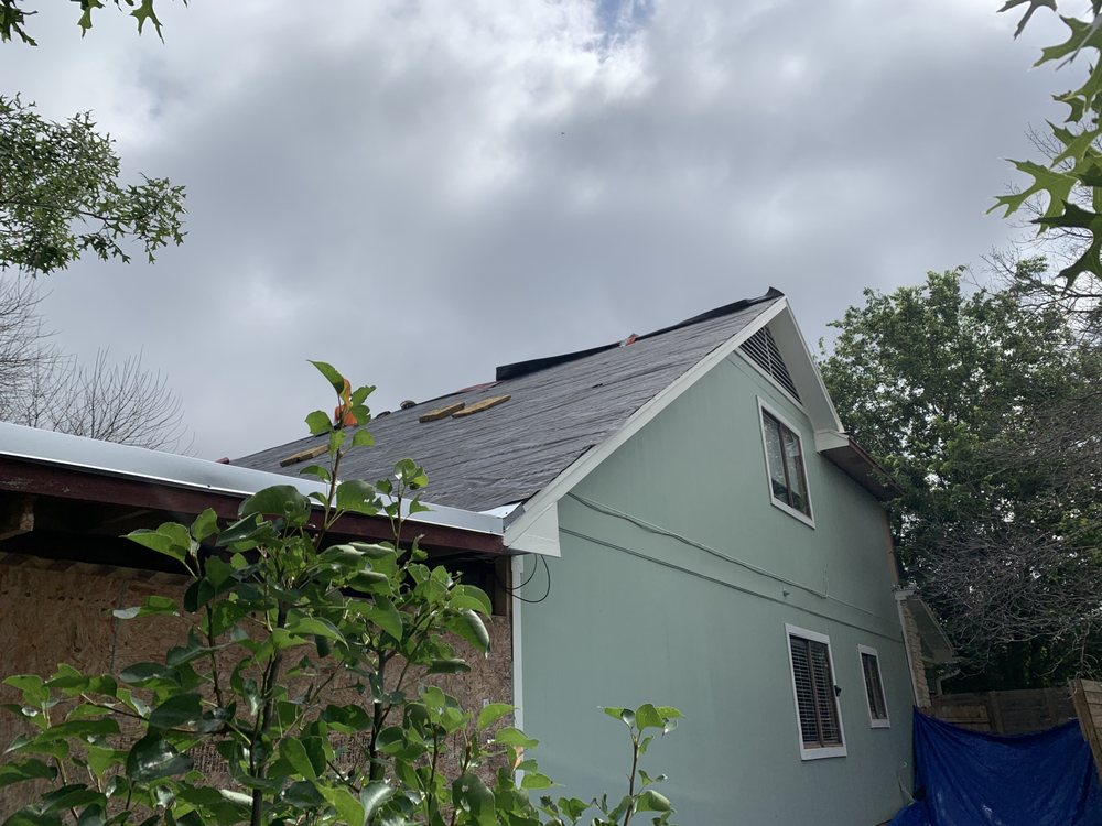 Slide of Salvador Roofing Services