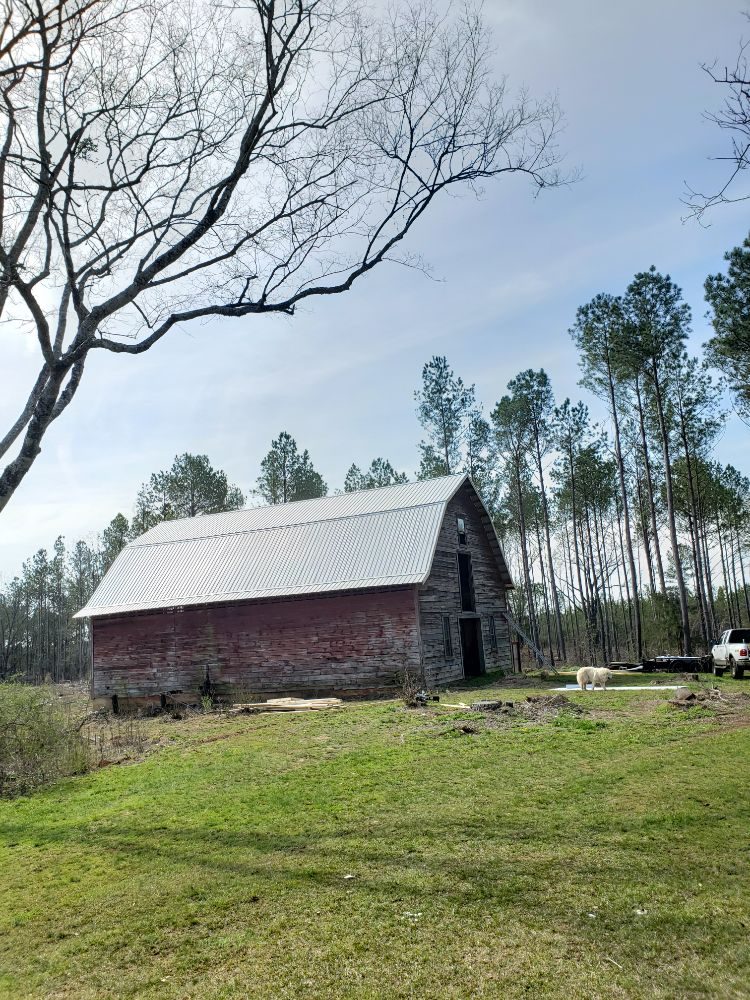 Slide of Ram's Roofing Service