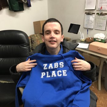 ZABS Place - One of the ZABS Talent Employees showing off a sweatshirt he bought at here and then customized to show his love for working at ZABS! - Thrift Stores Near Me - Matthews, North Carolina