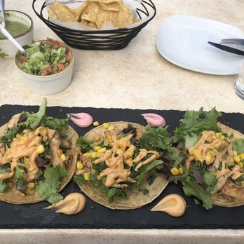 Primos Locos - Pollo Loco tacos and side of guacamole - Mexican Near Me - Elmhurst, Illinois Primos Locos - Pollo Loco tacos and side of guacamole - Mexican Near Me - Elmhurst, Illinois