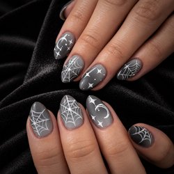 Pure Nails Spa - Moonlight, spiderwebs, and a little Halloween magic. Moody, chic, and made for spooky season at Pure Nails Spa.