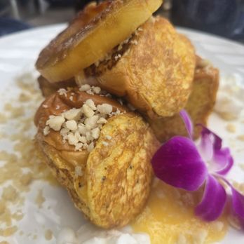 Chandler's Oceanfront Dining - Hawaiian French toast. Innovative use of rolls & topped w/ mac nuts. Missing that custard consistency, but good. - New American Near Me - Carlsbad, California