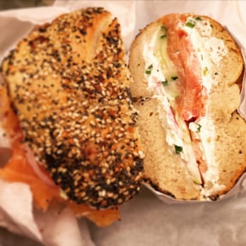 Ess-a-Bagel - Toasted Everything Bagel with Nova, Scallion Cream Cheese, tomatoes, onions, and cucumbers. - Bagels Near Me - New York, New York