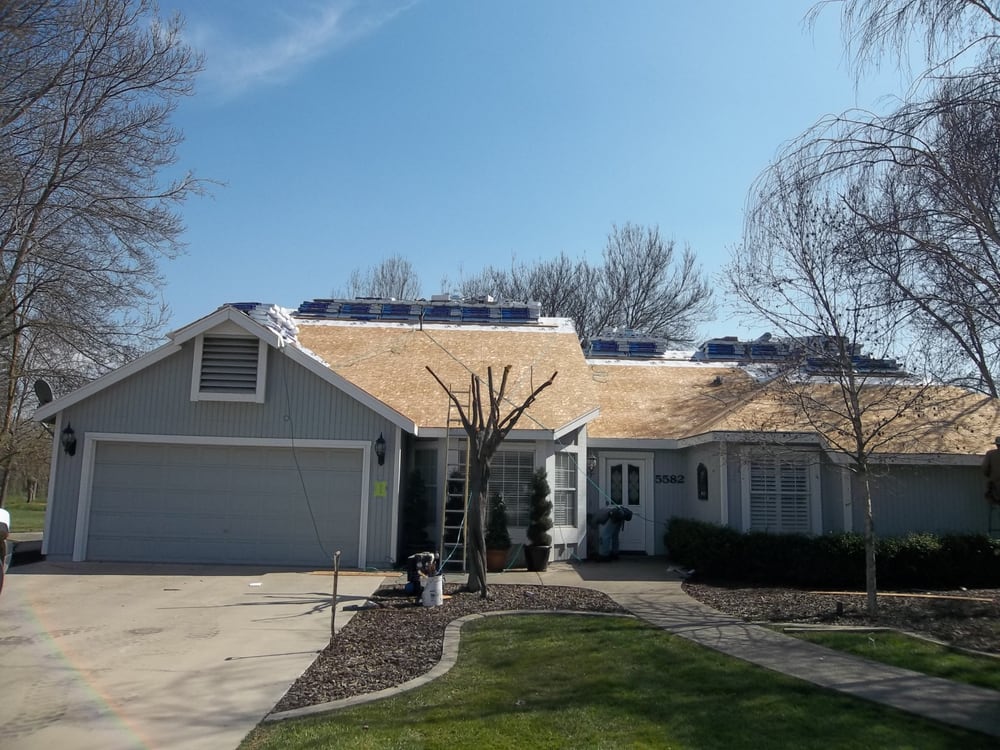 Slide of Benchmark Roofing