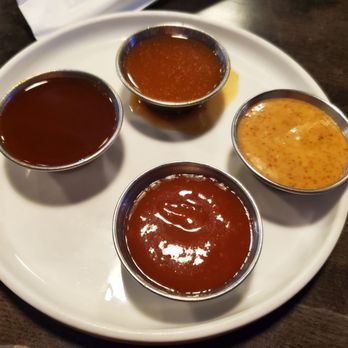 Dac's Smokehouse Morton - Clockwise - Carolina Vinegar, Mustard BBQ, Pineapple Habanero, Strawberry BBQ - Steakhouses Near Me - Morton, Illinois Dac's Smokehouse Morton - Clockwise - Carolina Vinegar, Mustard BBQ, Pineapple Habanero, Strawberry BBQ - Steakhouses Near Me - Morton, Illinois