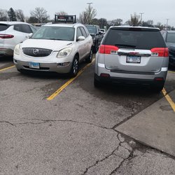 Hy-Vee - Catering manager's white buick parking job. Way to be late to work