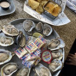 East Pass Seafood & Oyster House - Oysters (meh) and crab dip (dip was tasty but chips were extremely stale).