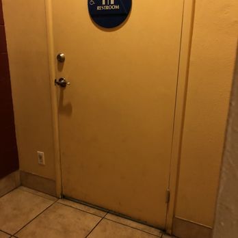 DeMatteo's Pizza - Scum and dirt on floor and upto 2/3rds of the door.  Just a little spray cleaner and towels will help the door - Pizza Near Me - Riverside, California