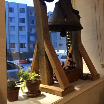 Bibber & Bell - a view of a building through a window - Beer, Wine & Spirits Near Me - Brooklyn, New York