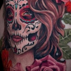 Faces in the Dark Tattoo - There is still a wee bit of bleeding on the face. Look past that and enjoy the beautiful artistry created by Saraloni.