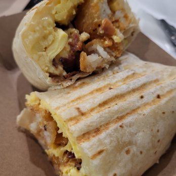 The Flying Yolk - The breakfast burrito, could have used some fresh salsa or tomatoes (A- grade) - Breakfast & Brunch Near Me - Simi Valley, California