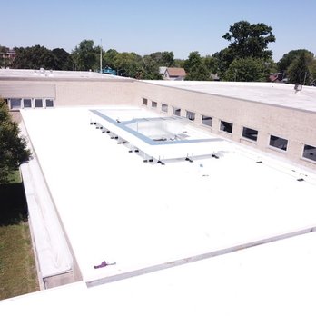 Royalty Roofing - New commercial flat roof featuring reflective, energy-efficient materials to lower cooling costs and extend roof lifespan - Roofing Near Me - Seymour, Indiana Royalty Roofing - New commercial flat roof featuring reflective, energy-efficient materials to lower cooling costs and extend roof lifespan - Roofing Near Me - Seymour, Indiana