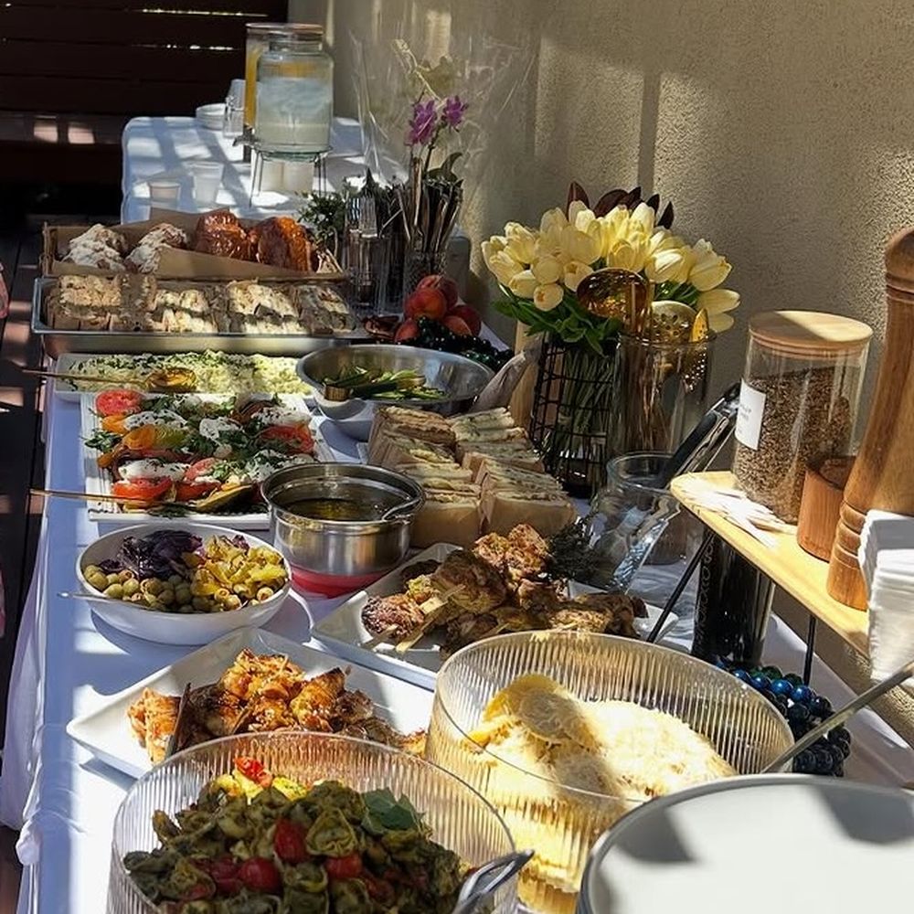 Grill Chef Events - Plenty of yummy choices on the table spread. - Caterers Near Me Grill Chef Events - Plenty of yummy choices on the table spread. - Caterers Near Me