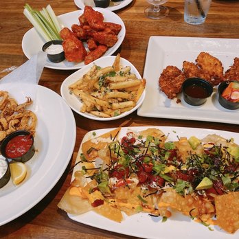 Yard House - IG: @KevinEatsItAll Hot wings, fried calamari, truffle fries, coconut shrimp, poke nachos - New American Near Me - Sacramento, California Yard House - IG: @KevinEatsItAll Hot wings, fried calamari, truffle fries, coconut shrimp, poke nachos - New American Near Me - Sacramento, California