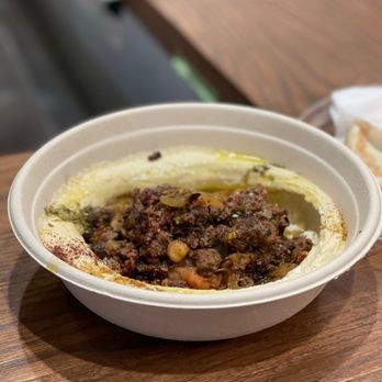 The Food District - a bowl of hummusle and pita bread - Food Stands Near Me - Mississauga, Ontario The Food District - a bowl of hummusle and pita bread - Food Stands Near Me - Mississauga, Ontario