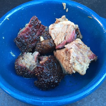 Mojo Old City BBQ - Burnt ends brisket appetizer. we had already most of it. Probably 12+ pieces in total order. Served with a tray of five different sauces. - Barbeque Near Me - St. Augustine, Florida