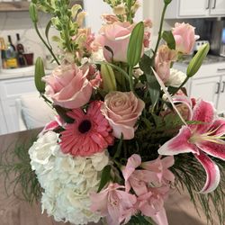 Black Forest Flowers And Gifts - Stargazer lilies, pink roses, snap dragons, hydrangeas, verbena daisies and greenery.