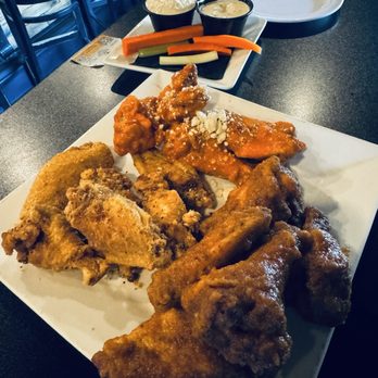 The Salty Dog Tavern - Wing Sampler Platter (Clockwise from 9pm) Lemon pepper dry rub, Buffalo blue, apple jerk. Sigh. So much promise. - Sports Bars Near Me - Southington, Connecticut The Salty Dog Tavern - Wing Sampler Platter (Clockwise from 9pm) Lemon pepper dry rub, Buffalo blue, apple jerk. Sigh. So much promise. - Sports Bars Near Me - Southington, Connecticut