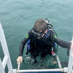 Climbing out after the last certification dive Climbing out after the last certification dive