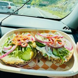 Everything bagels with scallion cream cheese, cucumber, red onions & chili crisp