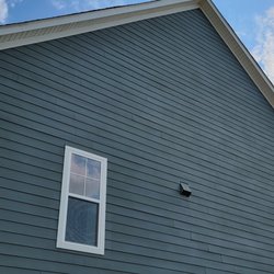 CSRA Pressure Wash - Large, high surface, with clean soffit and algae removed by soft wash.