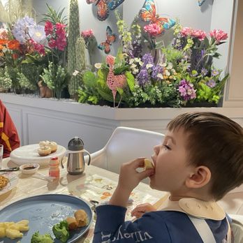 Mimi Garden - Son enjoying the indoor decor and snack plate - Dim Sum Near Me - Newport Beach, California Mimi Garden - Son enjoying the indoor decor and snack plate - Dim Sum Near Me - Newport Beach, California