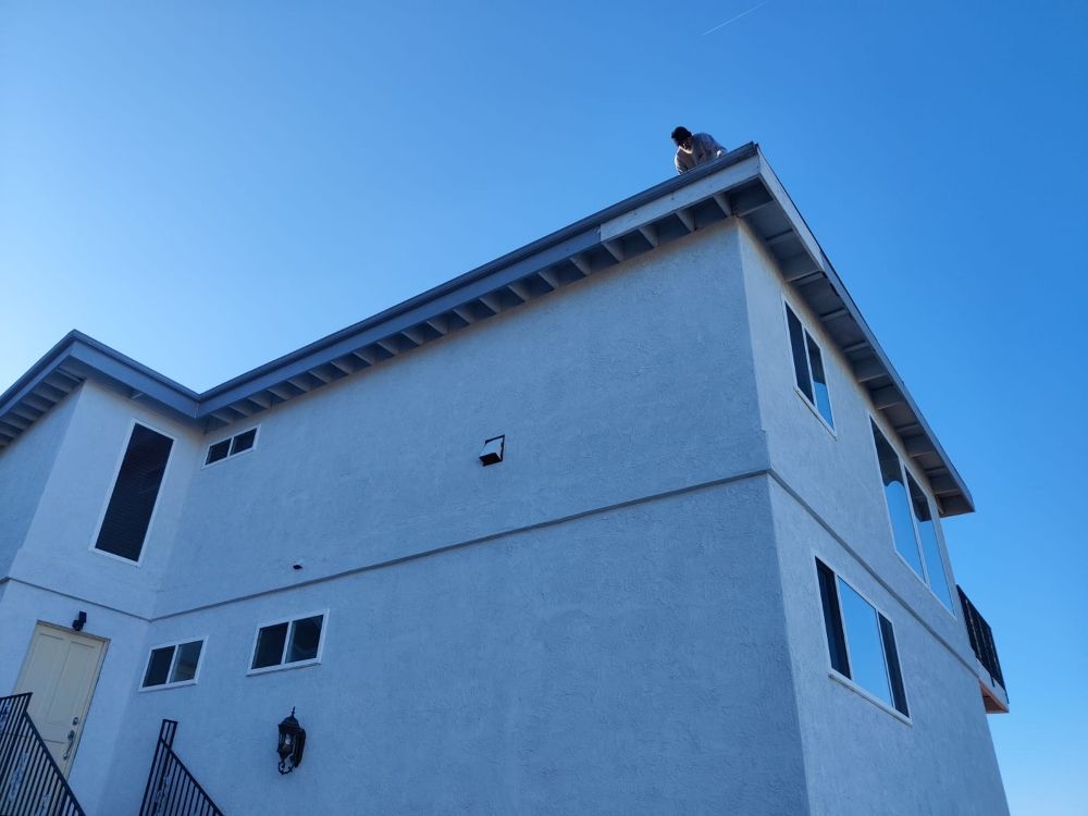 Slide of Alma Roofing