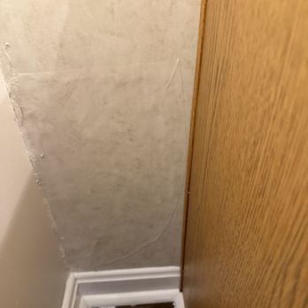 Black & White Kitchen & Bath - patched a wall they damaged with glue - General Contractors Near Me - Laytonsville, Maryland