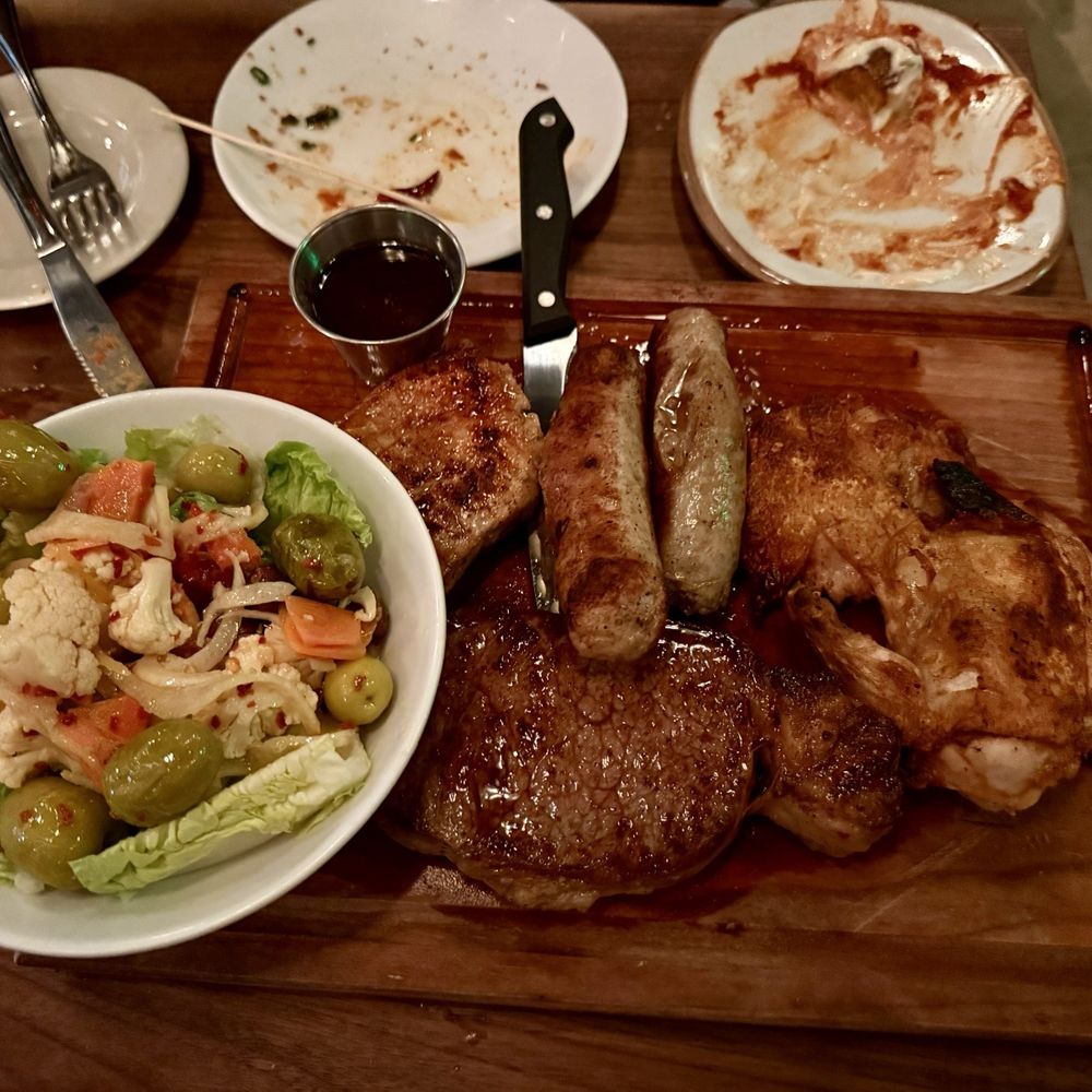 Barcelona Wine Bar - Parrillada Barcelona - steak, chicken, pork loin, gaucho sausage with salad - Tapas/Small Plates Near Me - Delray Beach, Florida