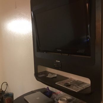 Motel 6 - TV wall stand with tiny table underneath - Hotels Near Me - Lewiston, Maine Motel 6 - TV wall stand with tiny table underneath - Hotels Near Me - Lewiston, Maine