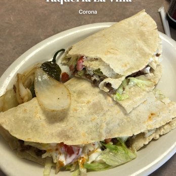 Taqueria La Villa - We ordered a Quesadilla de Asada, menudo, chilaquiles, taco de cabeza y tripa and the kids had pancakes and eggs - Mexican Near Me - Corona, California