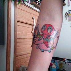 Lagniappe Custom Tattoos & Piercing