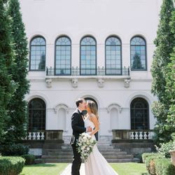 Juliana Kae Photography - Bride and groom sharing a kiss at Hanna Garden in Cleveland, Ohio