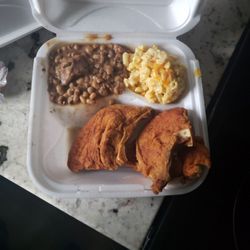 Madea’s Kitchen - Turkey chops with black eye peas and mac N Cheese.