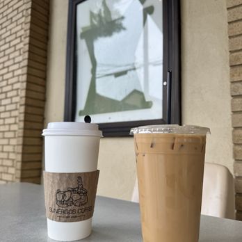 Sunergos Coffee - Hot oat milk latte and an iced latte - Coffee & Tea Near Me - Louisville, Kentucky Sunergos Coffee - Hot oat milk latte and an iced latte - Coffee & Tea Near Me - Louisville, Kentucky