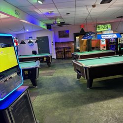 Cue And Brew Pub - Cue it up at the pool tables or the jukebox