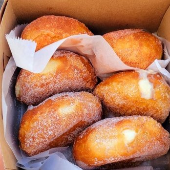 Leonard's Bakery - Malasadas - Fresh & Hot, baby! $1.35 each plain Malasadas without fillings. $1.80 each Malasadas with fillings (Macadamia). - Bakeries Near Me - Honolulu, Hawaii Leonard's Bakery - Malasadas - Fresh & Hot, baby! $1.35 each plain Malasadas without fillings. $1.80 each Malasadas with fillings (Macadamia). - Bakeries Near Me - Honolulu, Hawaii