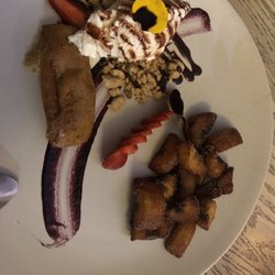 El Jardín de los Milagros - The flan was actually a bread. Vanilla ice cream and fried bananas. 120 pesos.