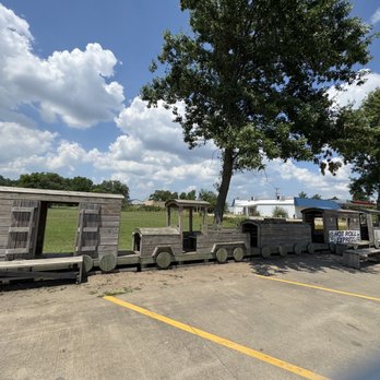 Lamberts Cafe - Wooded train along parking lot - American Near Me - Sikeston, Missouri